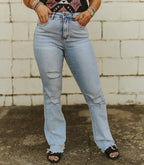 Light Wash High Rise Distressed Hem Boot Cut Jeans