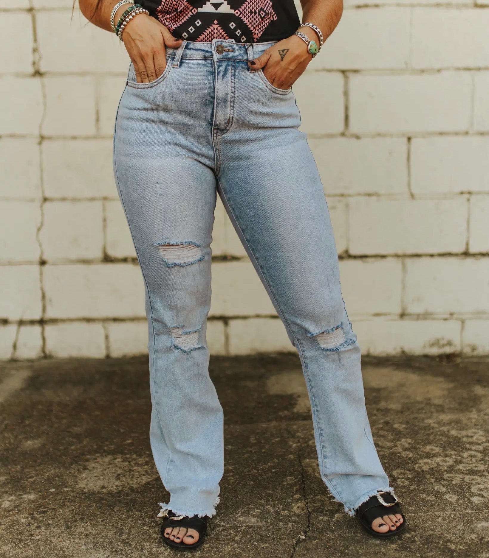 Light Wash High Rise Distressed Hem Boot Cut Jeans